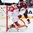 COLOGNE, GERMANY - MAY 6: Denmark's Sebastian Dahm #32 attempts to make a glove save while Latvia's Kaspars Daugavins #16 looks on during preliminary round action at the 2017 IIHF Ice Hockey World Championship. (Photo by Andre Ringuette/HHOF-IIHF Images)

